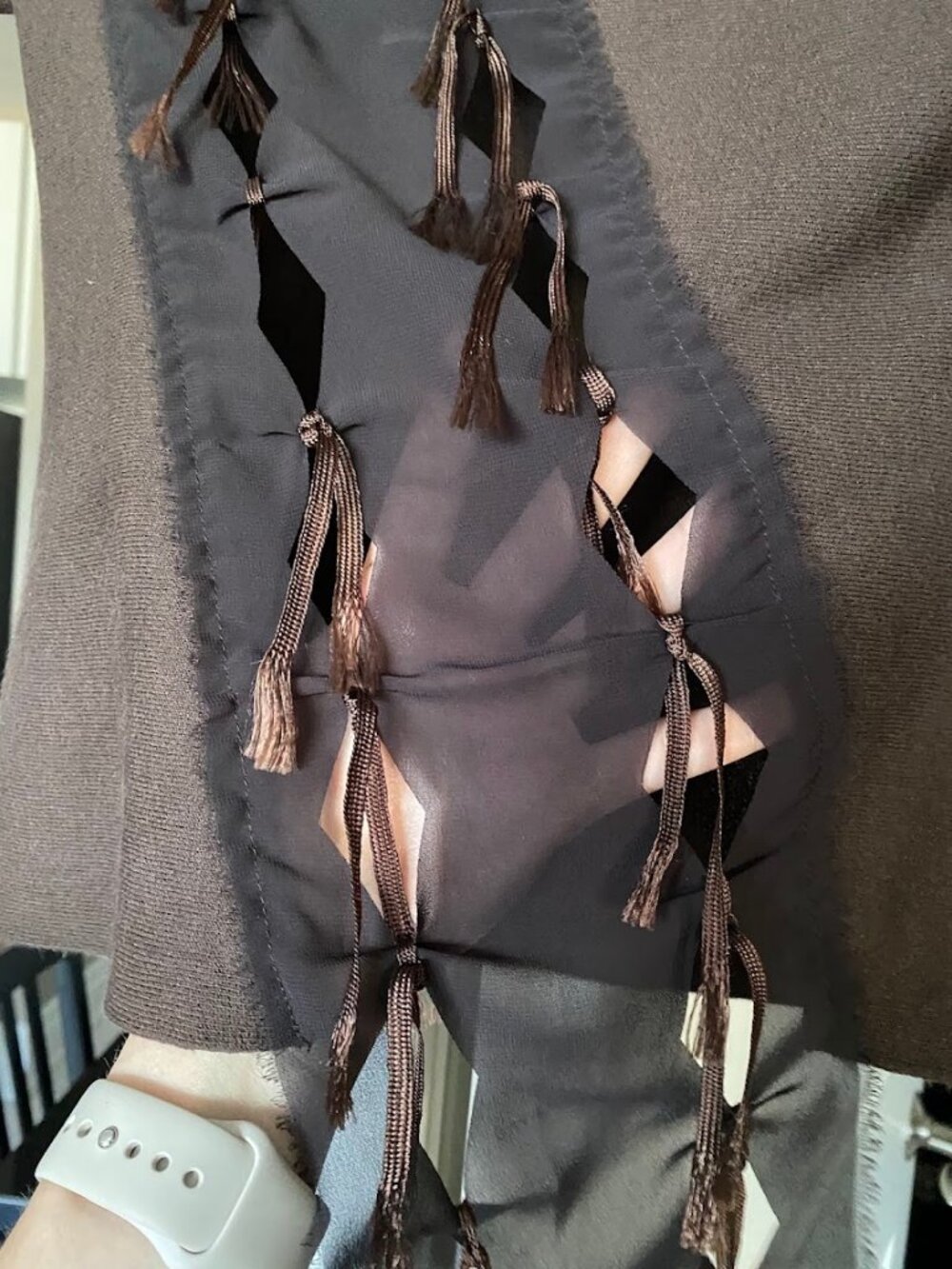Amaya Arzuaga brown stretch top.